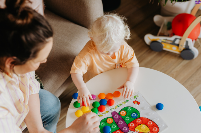 9–12 Months: Movement & Imitation
