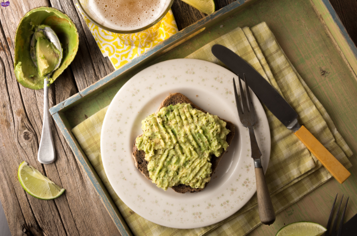 Baby weight gain foods – mashed avocado on toast rich in healthy fats for healthy baby growth