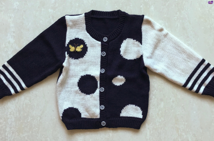 Soft knitted baby cardigan featured in baby winter dresses for layering and extra warmth