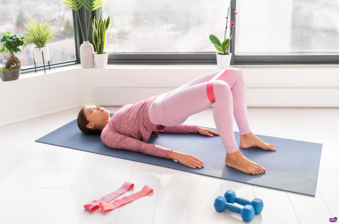 Pregnant woman doing pelvic floor exercises (Kegels) as part of exercises for a healthy pregnancy and normal delivery at home
