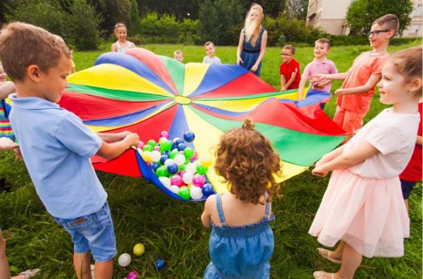 when do babies play with other babies