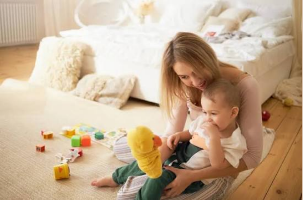 when do babies play with other babies